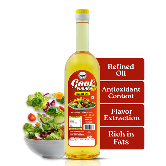 GOLD COIN cooking oil poured over a fresh garden salad in a glass bowl